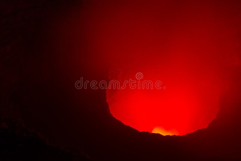 Night time shot of the glowing red steam being let out into the air from this Volcano near Managua, Nicaragua. Night time shot of the glowing red steam being let out into the air from this Volcano near Managua, Nicaragua