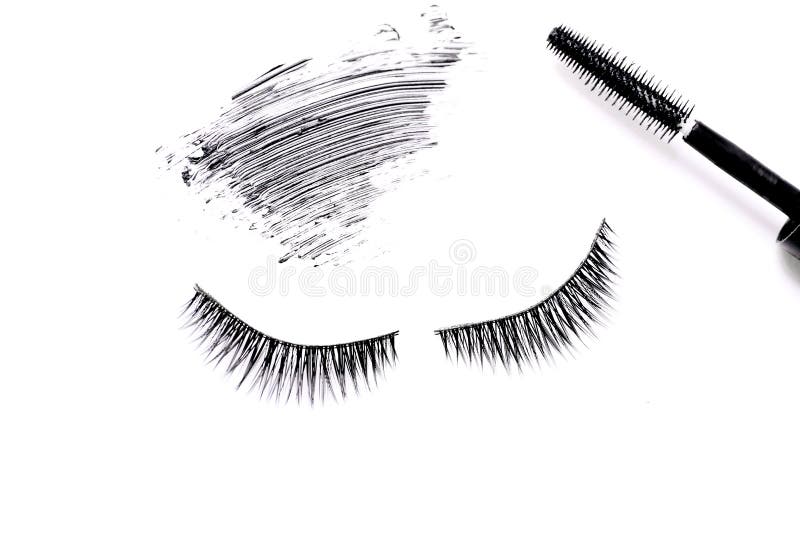Mascara Brush with Mascara Stroke and Fake False Eyelashes on White