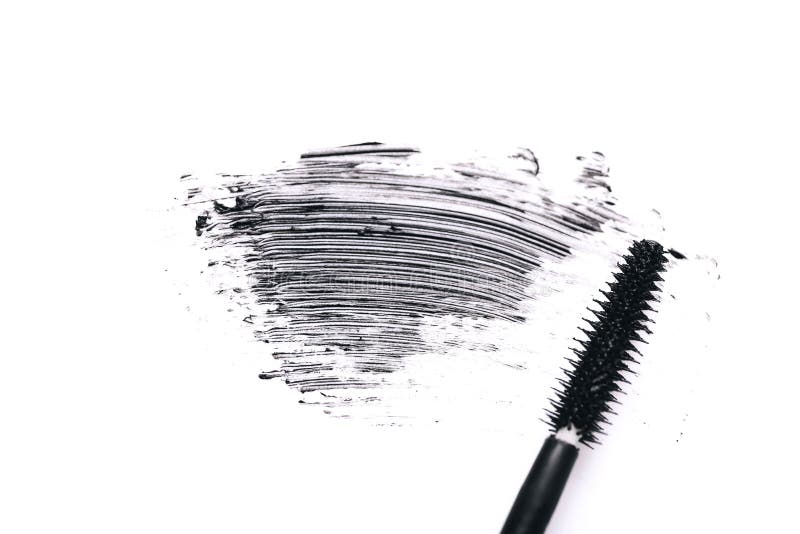Mascara Brush with Mascara Stroke and Fake False Eyelashes on White