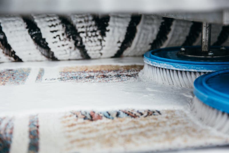 Maschinenreinigungsteppich lizenzfreie stockfotografie Maschinenreinigungsteppich lizenzfreie stockfotografie