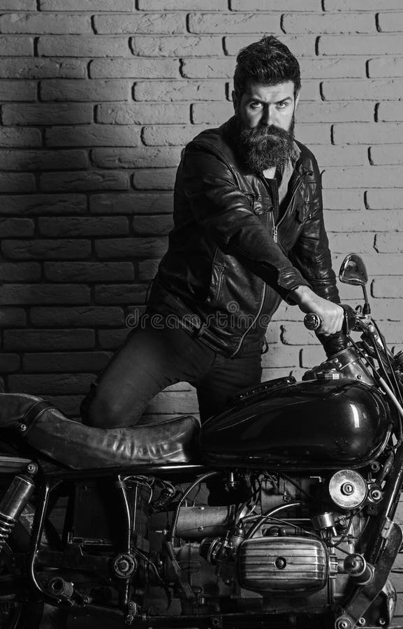 A Man in Black Leather Jacket Sitting Beside the Motorbike · Free Stock  Photo