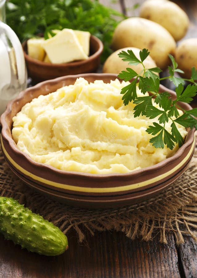 Mashed potato with milk stock image. Image of melted 186015805