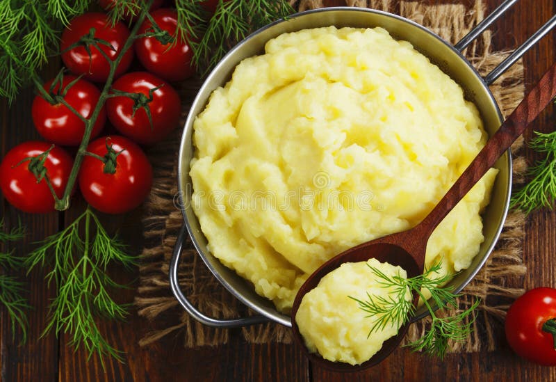 Mashed potato with milk stock image. Image of melted 186015805