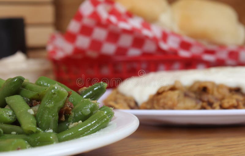 Mashed Potatoes and Green Beans in Rural Cafe Restaurant Stock Image