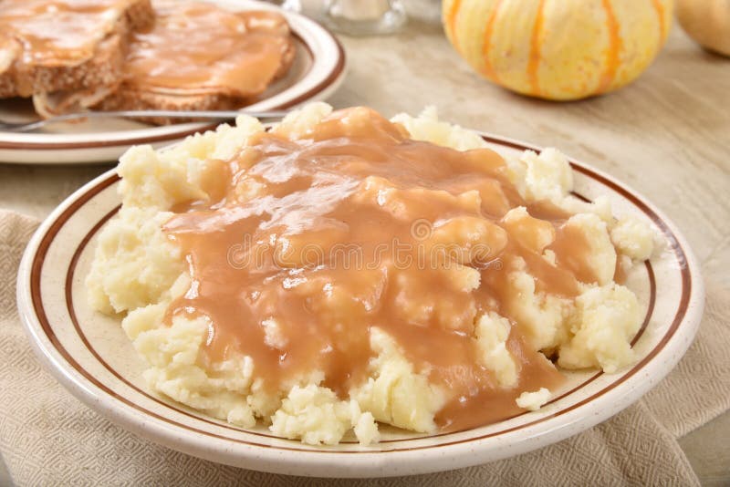 Mashed Potatoes and Turkey Gravy Stock Image - Image of gourmet