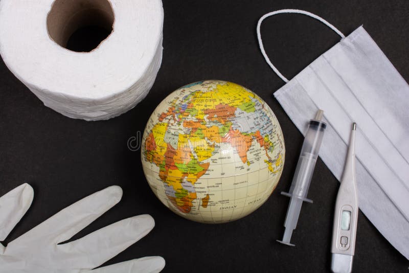 Mask, globes, gloved, syringe, Concept saves world from viruses. Coronavirus 2019 Pandemic. World epidemic concept. Mask, globes, gloved, syringe royalty free stock images Mask, globes, gloved, syringe, Concept saves world from viruses. Coronavirus 2019 Pandemic. World epidemic concept. Mask, globes, gloved, syringe royalty free stock images