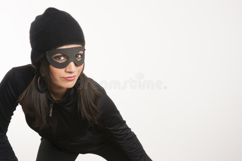 Masked Woman Sneaking Lurking Around Looking For Something to Steal