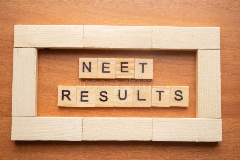 Maski, India 26,May 2019 : NEET or National Eligibility and Entrance Test RESULTS in wooden block letters royalty free stock photo Maski, India 26,May 2019 : NEET or National Eligibility and Entrance Test RESULTS in wooden block letters royalty free stock photo