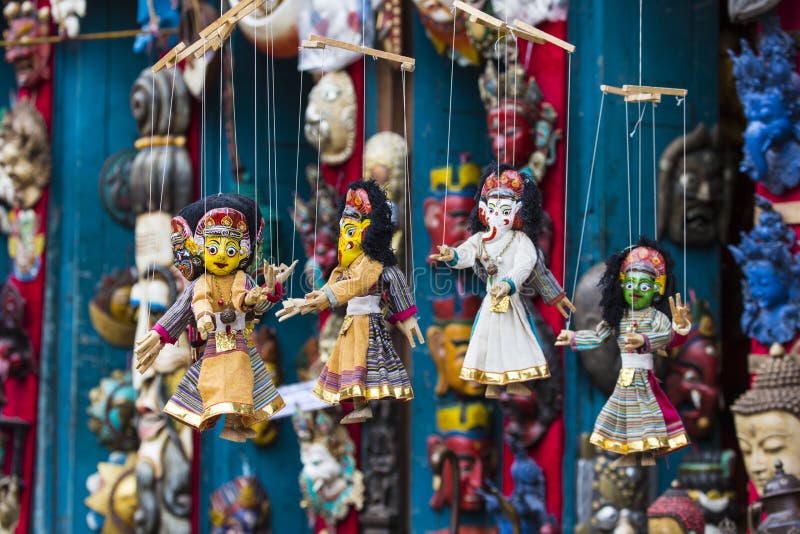 Masks, dolls and souvenirs in street shop at Durbar Square in Ka