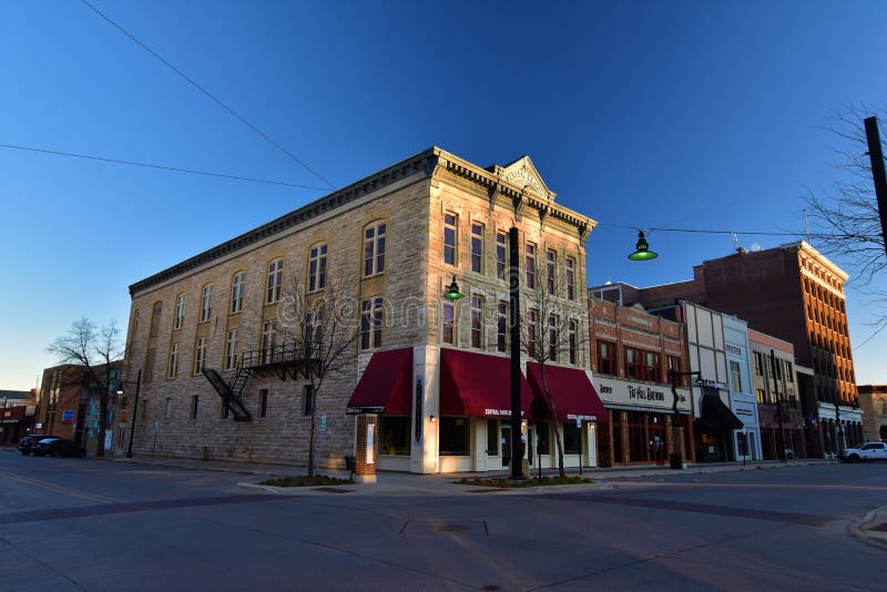 Mason city iowa historic downtown architecture under green street lamps