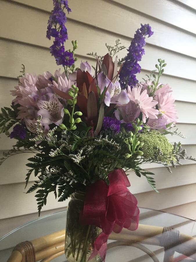 Mason Jar flowers stock photo. Image of mason, lilies 61778354
