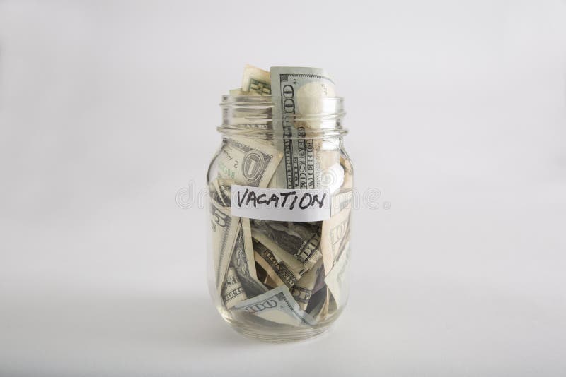 Mason jar with money for Vacation stock images Mason jar with money for Vacation stock images