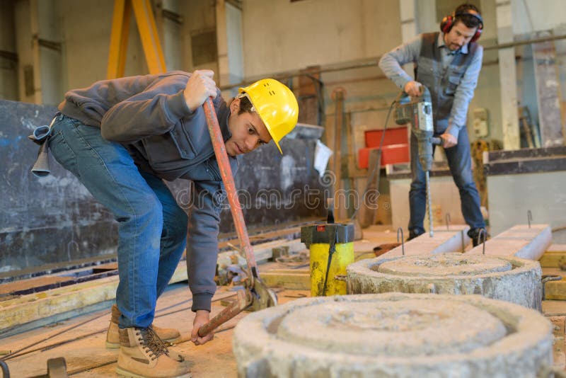 Mason workers making cement form royalty free stock image