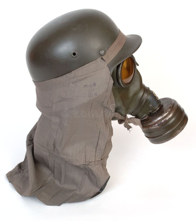 German gas mask M38 and anti gas neck shield worn with combat helmet M40 from the second world war. German gas mask M38 and anti gas neck shield worn with combat helmet M40 from the second world war.