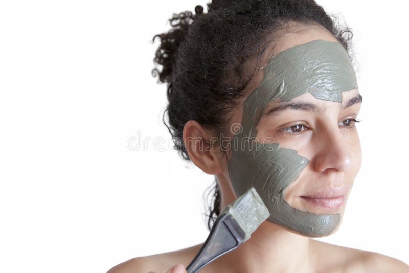 Masque facial d'argile dans la station thermale de beauté image libre de droits Masque facial d'argile dans la station thermale de beauté image libre de droits