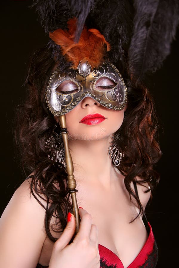 Masquerade. Woman With Carnival Mask On Face Stock Photo 