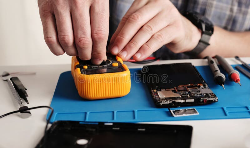 Master Cheching Circuit Connection On Microchip Board In Service Center royalty free stock image