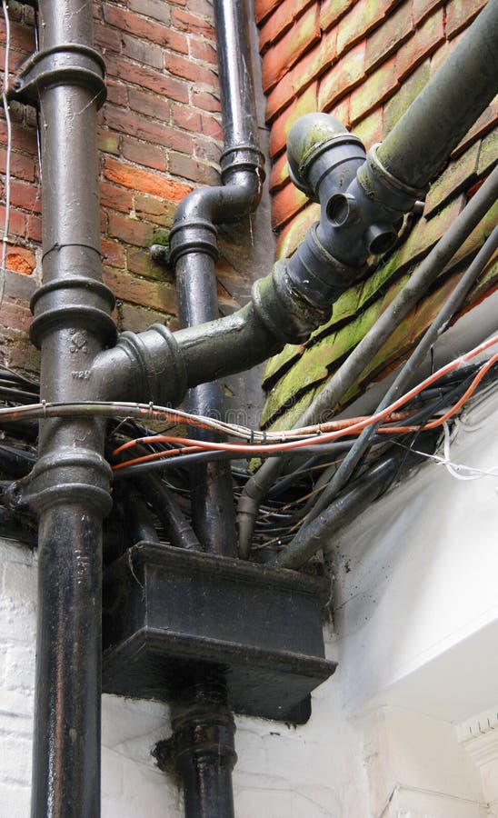 Mass of wiring, cables and piping stock image