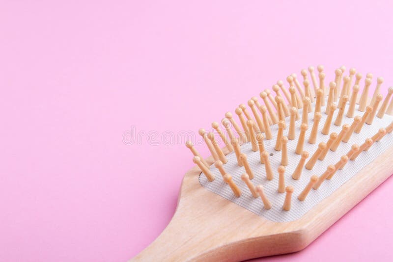 Massage Comb To Stimulate Hair Growth. Comb on Isolated Background