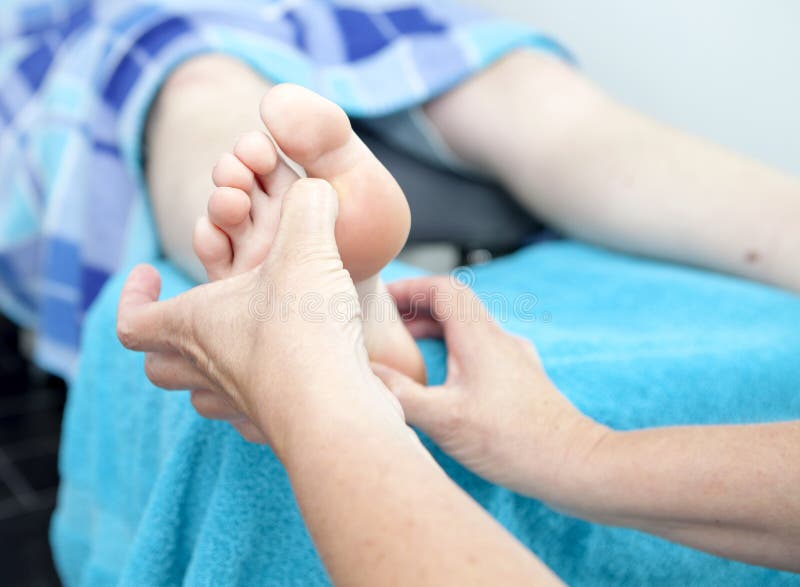Massage feet by pedicure stock photo. Image of massage 63734780