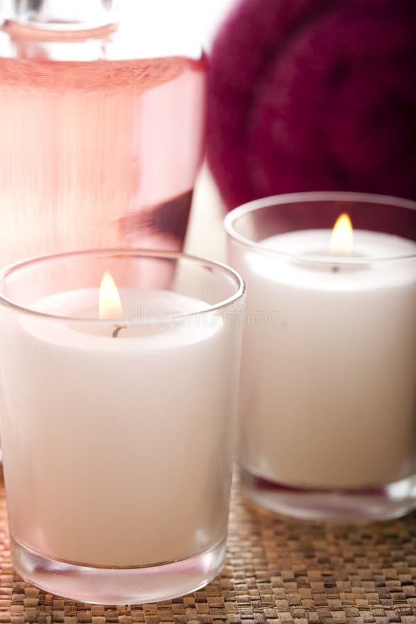 Massage oil and candles stock image. Image of packshot 11155391