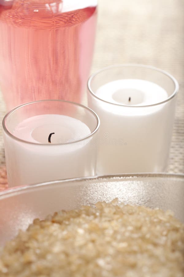 Massage oil and candles stock image. Image of perfume 11155447