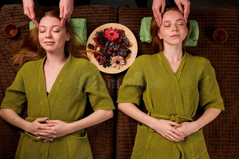 Professional Massage Therapist Gives Head Massage To Two Women Stock Image Image Of Person