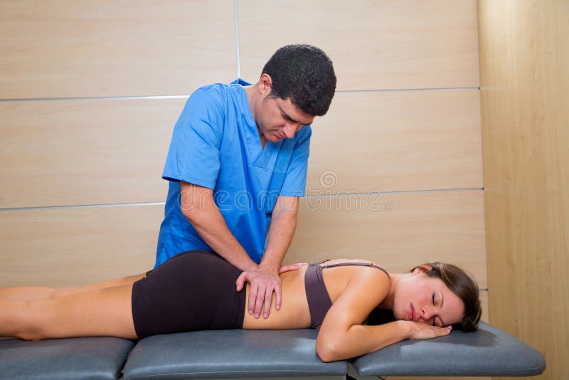 Massage therapy by physiotherapist on woman back royalty free stock photo Massage therapy by physiotherapist on woman back royalty free stock photo