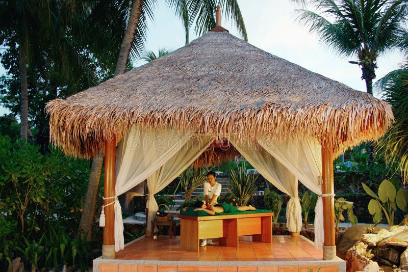 Massage in tropical spa.