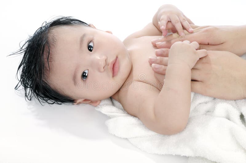 Massaggio del bambino fotografia stock Massaggio del bambino fotografia stock