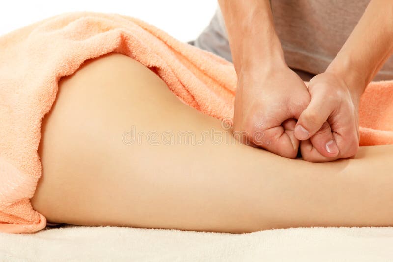 Masseur makes anticellulite massage young women isolated on white background. Masseur makes anticellulite massage young women isolated on white background