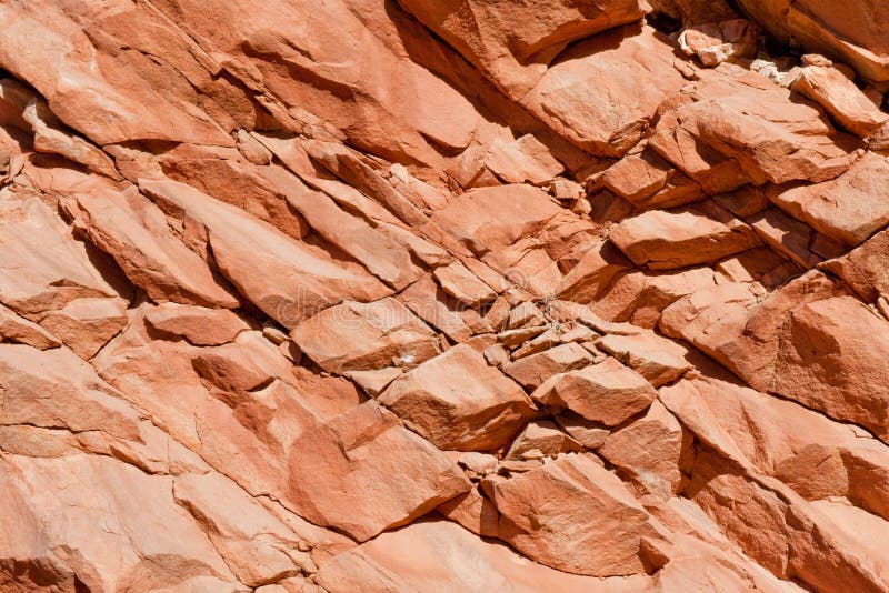 Close up of colorful red boulders on rock face, Arizona desert, U.S.A. Close up of colorful red boulders on rock face, Arizona desert, U.S.A.