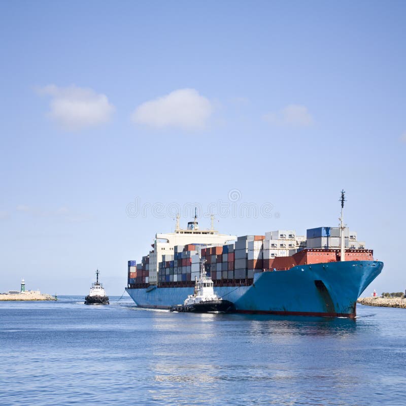 Massive Container Ship Entering River Mouth