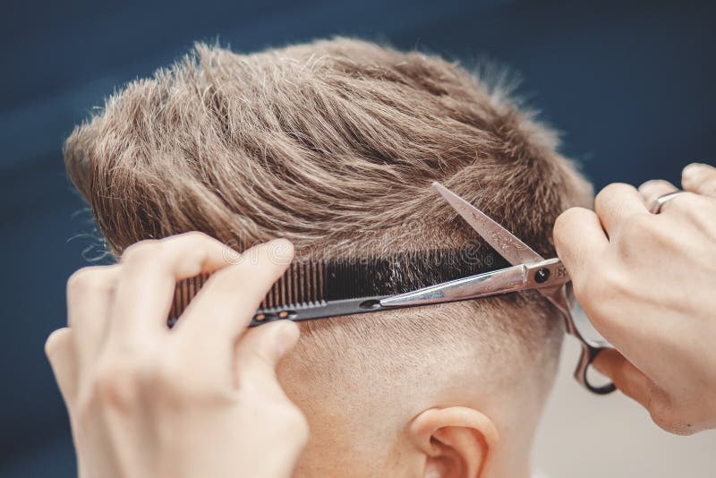 Master Barber Holds Scissors and Comb for Cutting Hair To Client in Men Salon Stock Photo - Image of barbershop, brown: 195444334 Master Barber Holds Scissors and Comb for Cutting Hair To Client in Men Salon Stock Photo - Image of barbershop, brown: 195444334