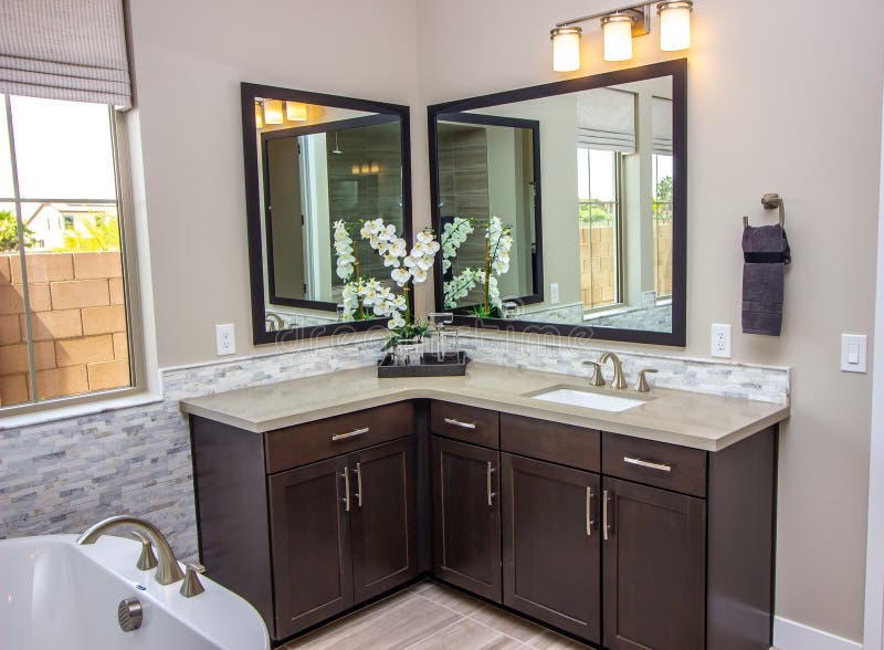 Master Bathroom Vanity, Mirrors and Bathtub Stock Photo Image of