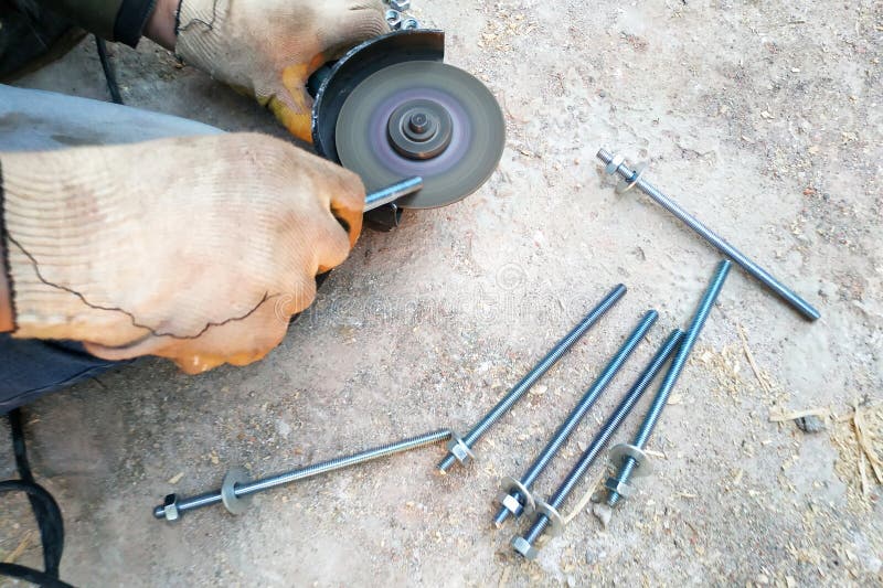 The Master Cuts and Bolts the Bolts Using an Angle Grinder Stock Photo Image of engine, angle