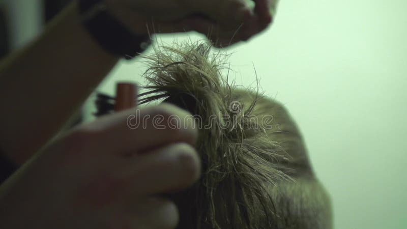 Master making hair style