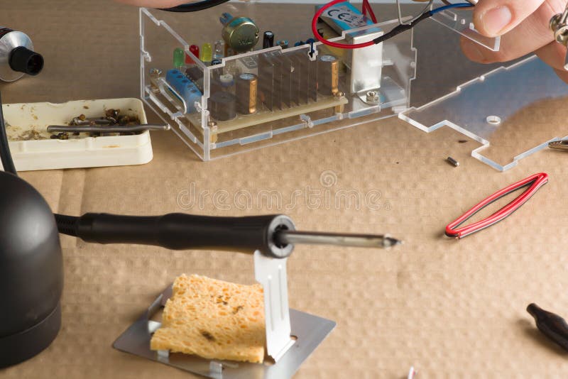 Master in repair shop stock photos