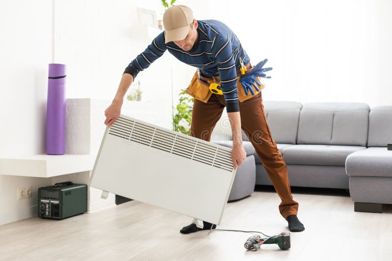 The Master Repairs the Electric Heater Stock Image Image of