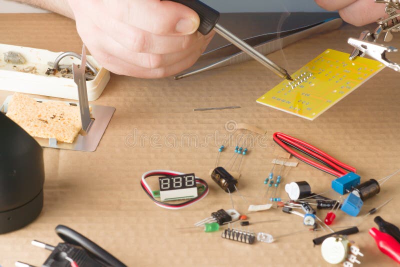 Master in repair shop stock photos