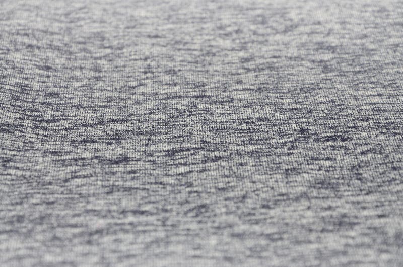 Material tricotat cu iarbă-neagră real fabricat din fibre sintetice de fond texturat. textură de țesătură colorată. fundal cu band stock photography