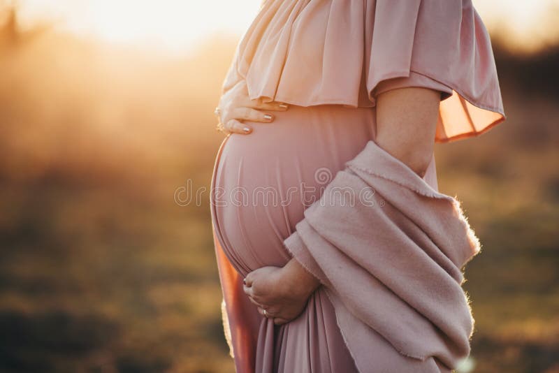 Maternity belly, sunset