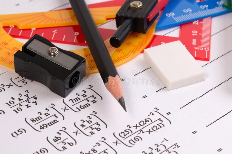 Math quadratic equation concepts. School supplies used in math. Math drawing tools with math equipment.