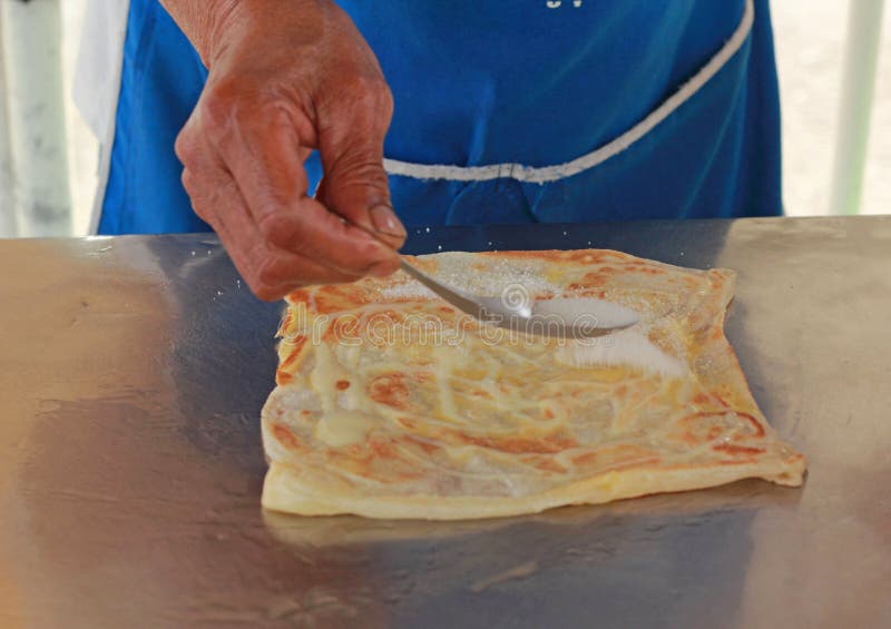 Matlagningchapati på tabellen arkivfoto