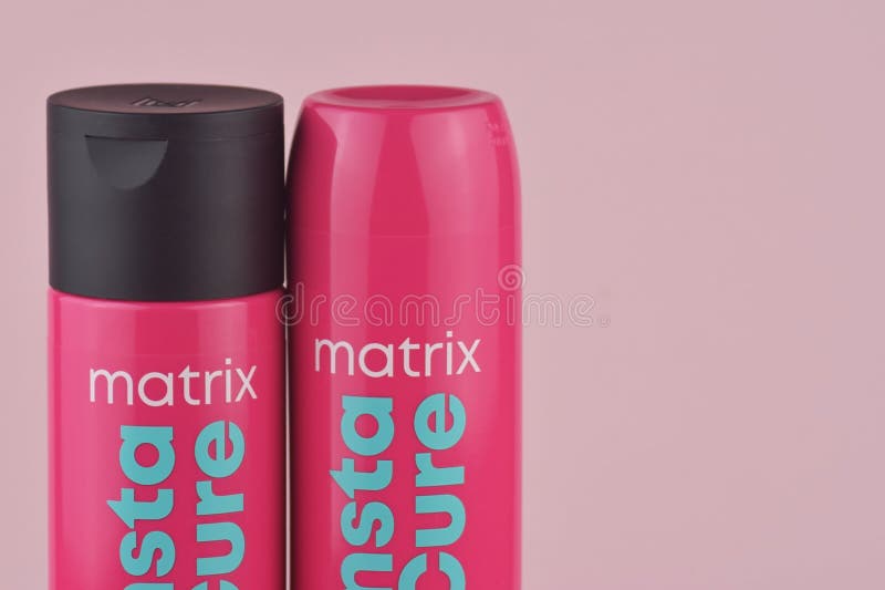 Matrix Insta Cure shampoo on the pink background stock image