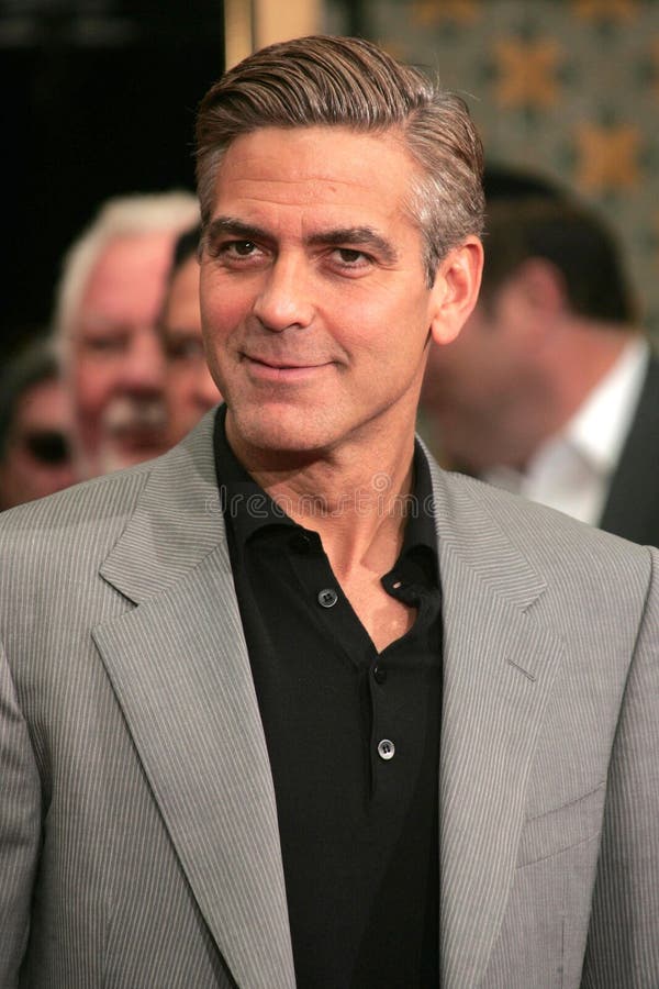 George Clooney at the "Ocean's Thirteen" Handprint and Footprint Ceremony honoring George Clooney, Brad Pitt, Matt Damon, and Jerry Weintraub. Grauman's Chinese Theatre, Hollywood, CA. 06-05-07. George Clooney at the "Ocean's Thirteen" Handprint and Footprint Ceremony honoring George Clooney, Brad Pitt, Matt Damon, and Jerry Weintraub. Grauman's Chinese Theatre, Hollywood, CA. 06-05-07