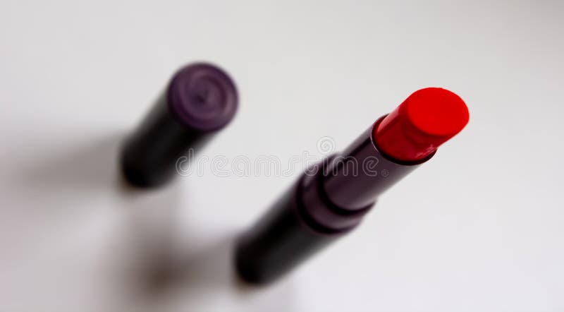 Matte lipstick red on a white background royalty free stock photography