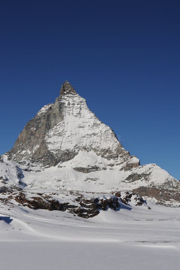 Matterhorn Mountain Peak in Alps in Winter with Snow and Clear Blue Sky ...