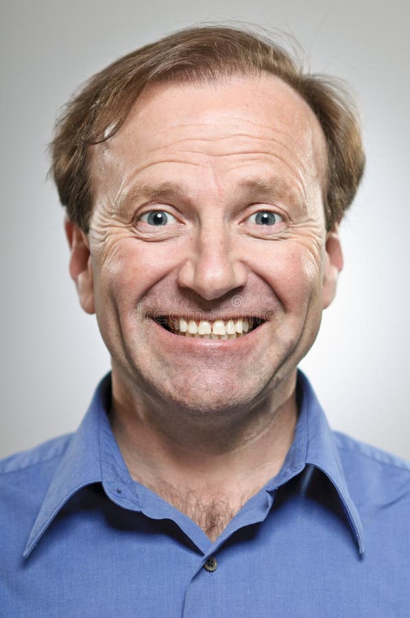 Mature Caucasian Man With Anxious Smile royalty free stock images