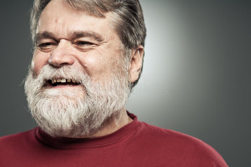 Mature Caucasian Man Laughing And Looking Away royalty free stock images